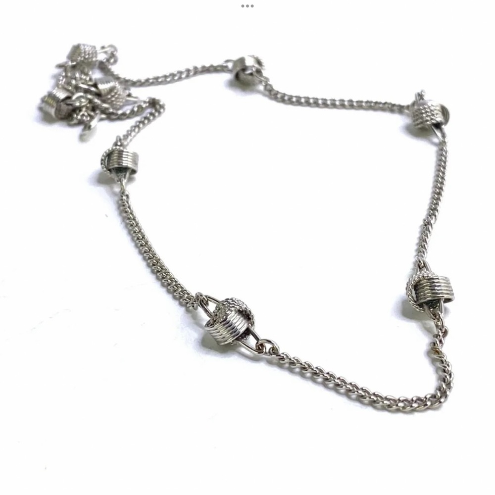 Vintage Avon signed love knot silver toned necklace 15”